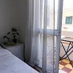 Aconchego De Quartos No Centro De *