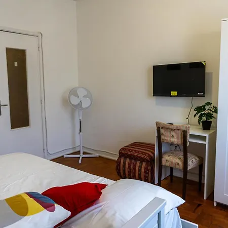 Aconchego De Quartos No Centro De